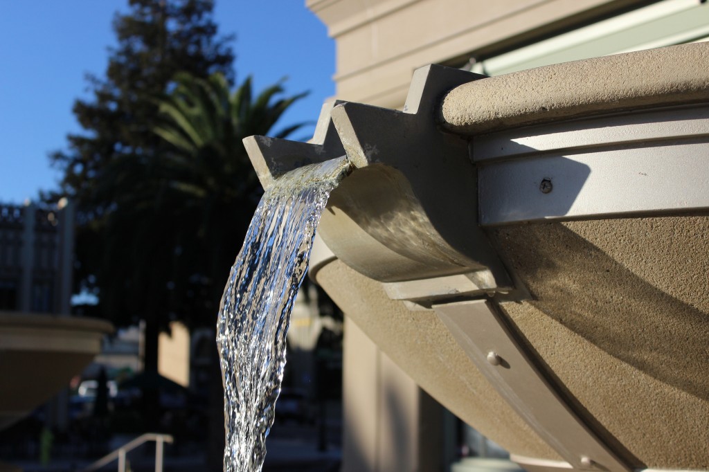 Fountains run in Courthouse Square outside the San Mateo County History Museum in downtown Redwood City, pictured on Oct. 28, 2014. (Allison McCartney/Peninsula Press)