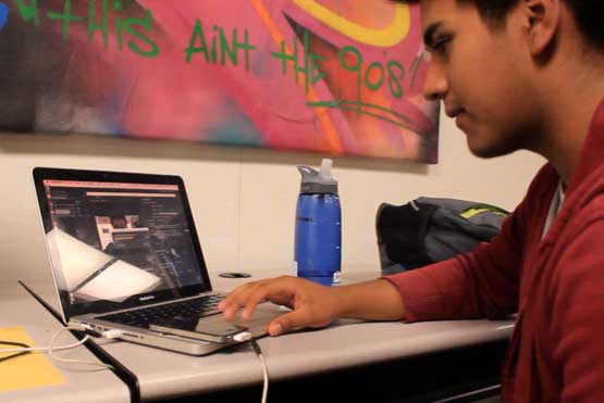 High school senior Sergio Flores highlights his passion for moviemaking on Ambition Spotlight at the StreetCode Academy headquarters in East Palo Alto. (Sabrina Elfarra/Peninsula Press)