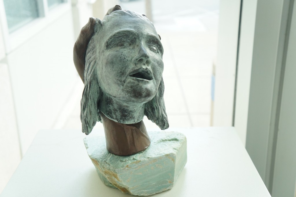 "Heads and Hands" sculpture piece