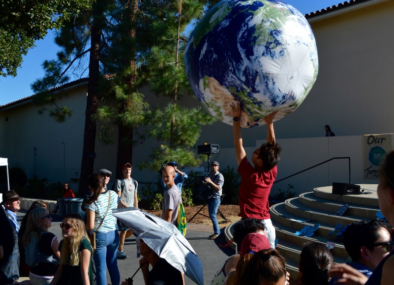 The world in the hands of the next generation, at the Oct. 2 rally. (Kim Kenny/Peninsula Press)
