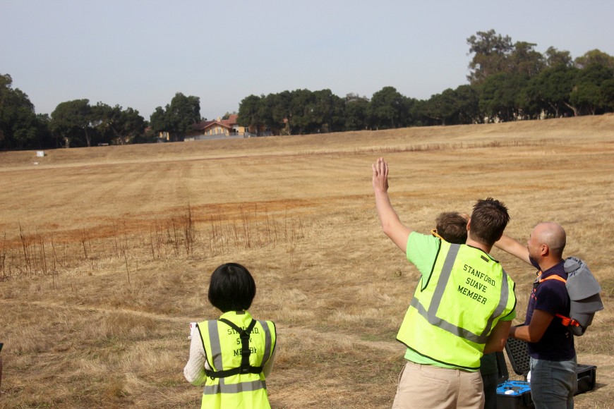 A group of Stanford students track the flight of a DJI Phantom. (Naomi Cornman/Peninsula Press)