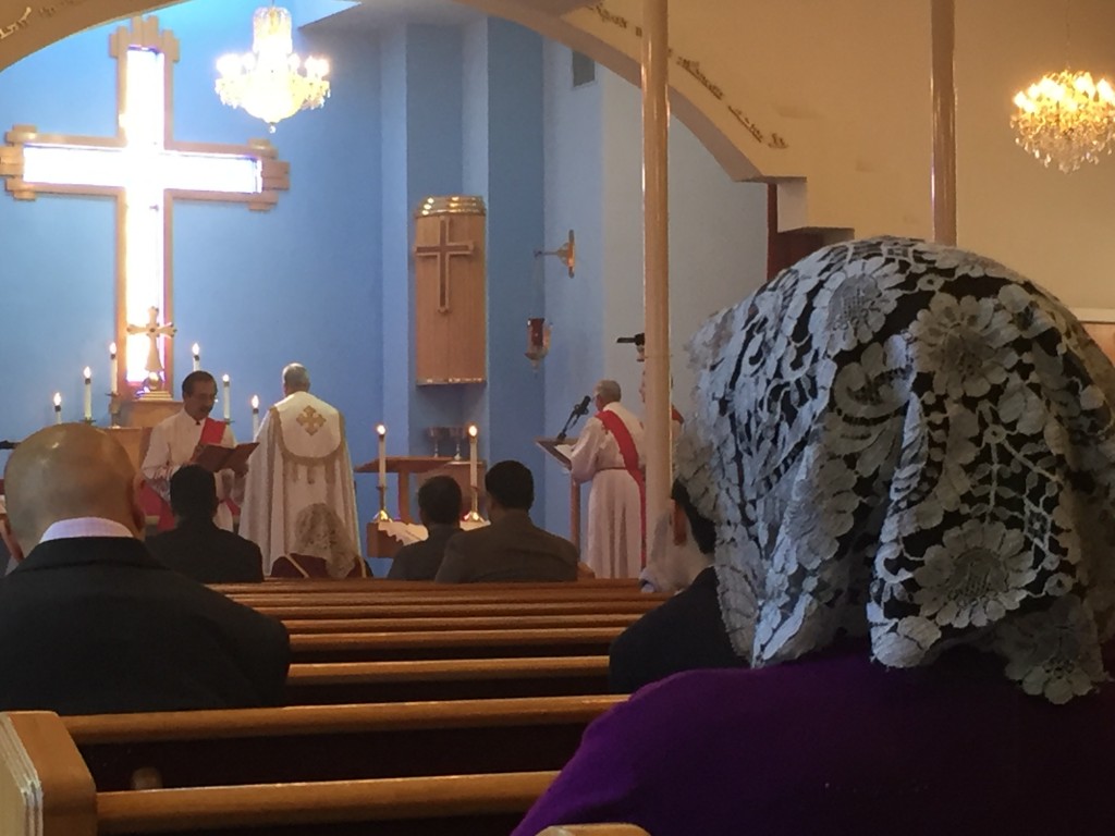 Parishioners worship at Mar Yosip Assyrian Church of the East in Nov. 2015. Assyrians -- one of the Middle East's oldest ethno-religious groups -- now face extinction at the hands of the Islamic State. (Kaitlyn Landgraf/Peninsula Press)