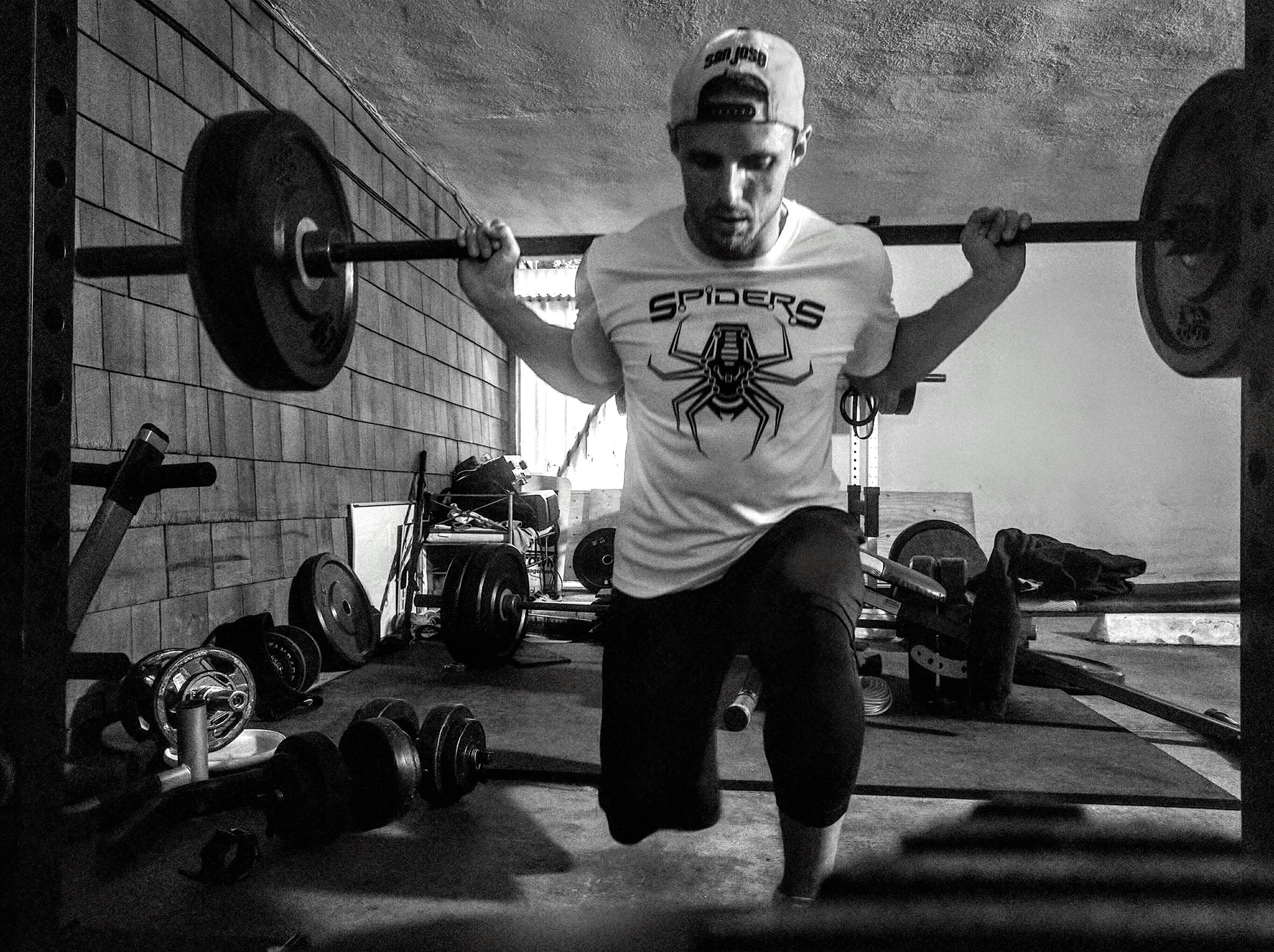 Zibi Braniecki pictured during a lifting session in his apartment garage. (Photo courtesy of Zibi Braniecki)