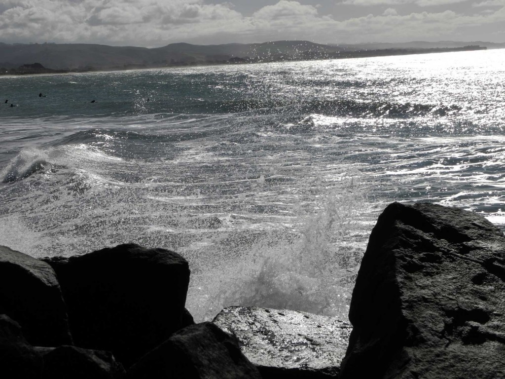 Waves wash up against the jetty. (Rosemary Mena-Werth/Peninsula Press)