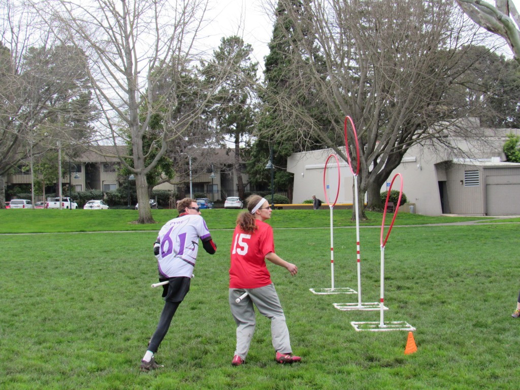 Martin Pyne and Ra Hopkins practice quidditch in Mountain View, California on February 18, 2017. (Virginia Fay/Peninsula Press)