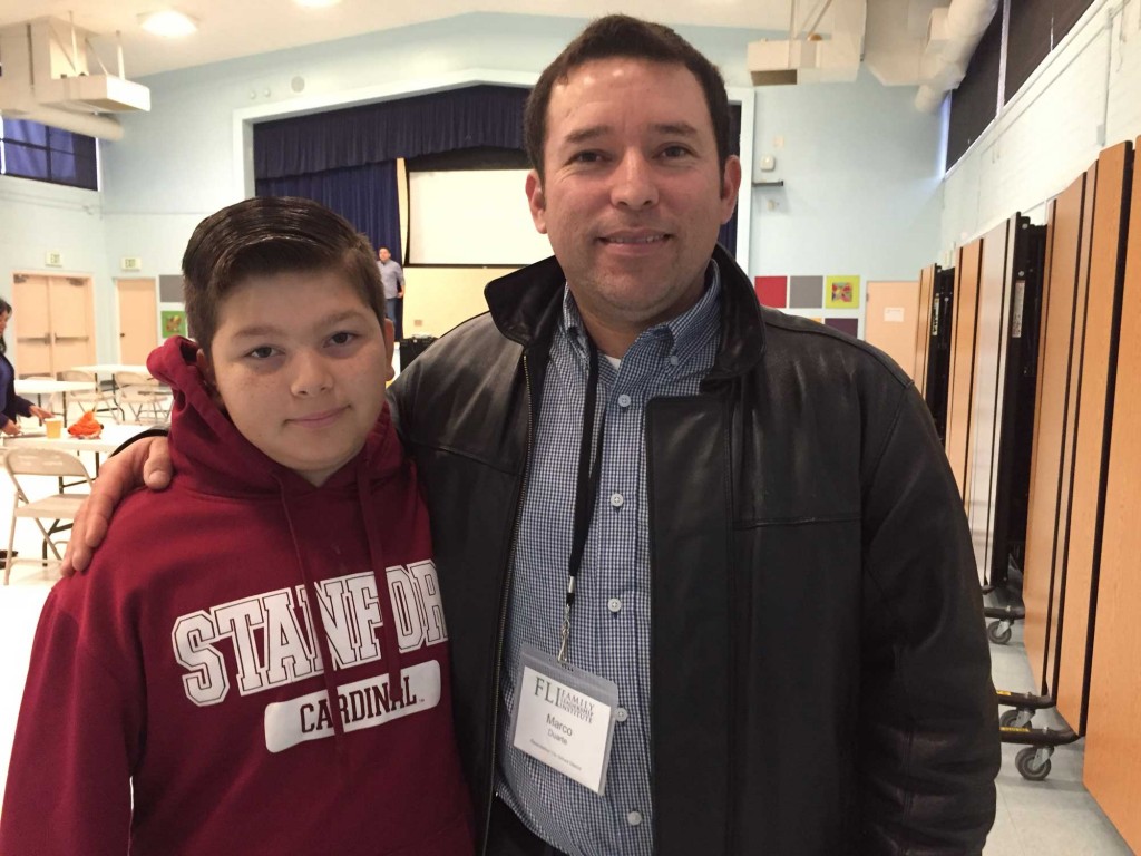 Marco Duarte (right) is president of the District Advisory Committee in the Ravenswood district. He has three kids in the school system, including Noel, a sixth grader. (Ashley Gross/Peninsula Press)