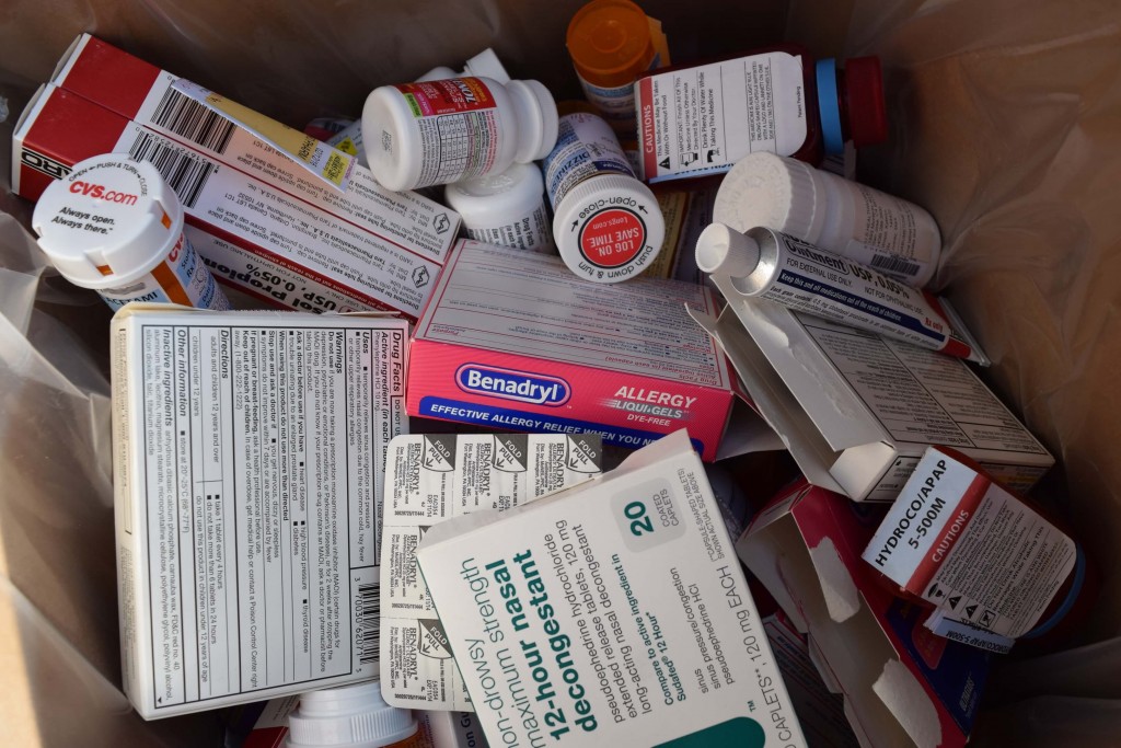 A pile of prescription drugs and over-the-counter medicine.