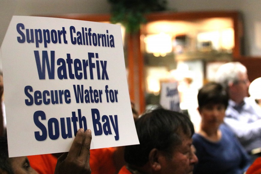 A labor union member holds a sign in support of WaterFix. (Katlyn Alo/Peninsula Press)