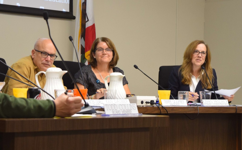 Interim Superintendent Karen Hendricks, right, addresses parents at the Palo Alto Unified School District board meeting on Oct. 10.