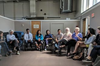Community members gather at the Ventura Neighborhood Association to talk about Wilton Court