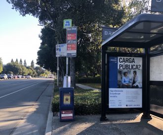 A billboard about the public charge rule at a bus stop on Page Mill Road in Palo Alto, Calif. on Oct. 5, 2019. The billboard directs people concerned about the proposed rule to call a San Mateo County help line.