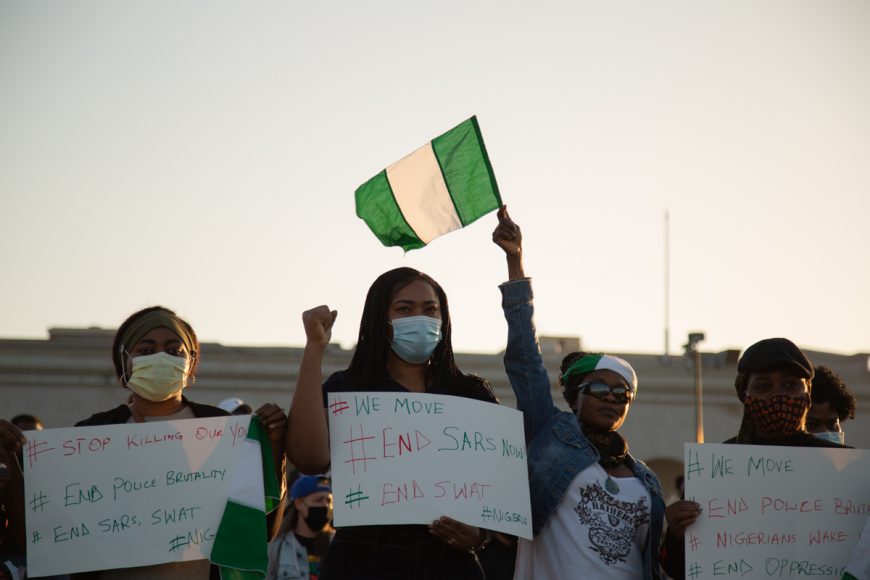 Hundreds of Bay Area residents - many Nigerian and Nigerian-American - gathered in Oakland, Calif. on Saturday, Oct. 24, 2020 to raise awareness of police brutality in Nigeria. (Noah Cortez, Peninsula Press) 