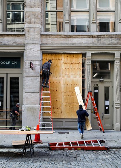 Workers board up the Ted Baker storefront located in SoHo, Manhattan in anticipation of
possible post-election incidents of looting. (Iman Floyd-Carroll/Peninsula Press)