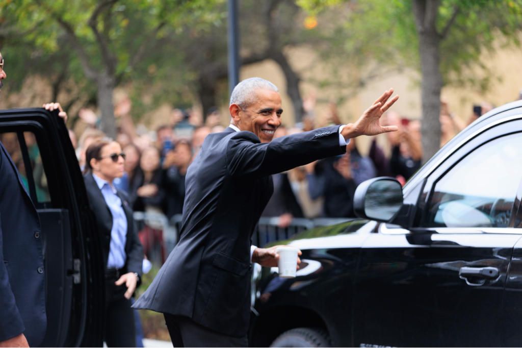 Barack Obama waves to a crowd