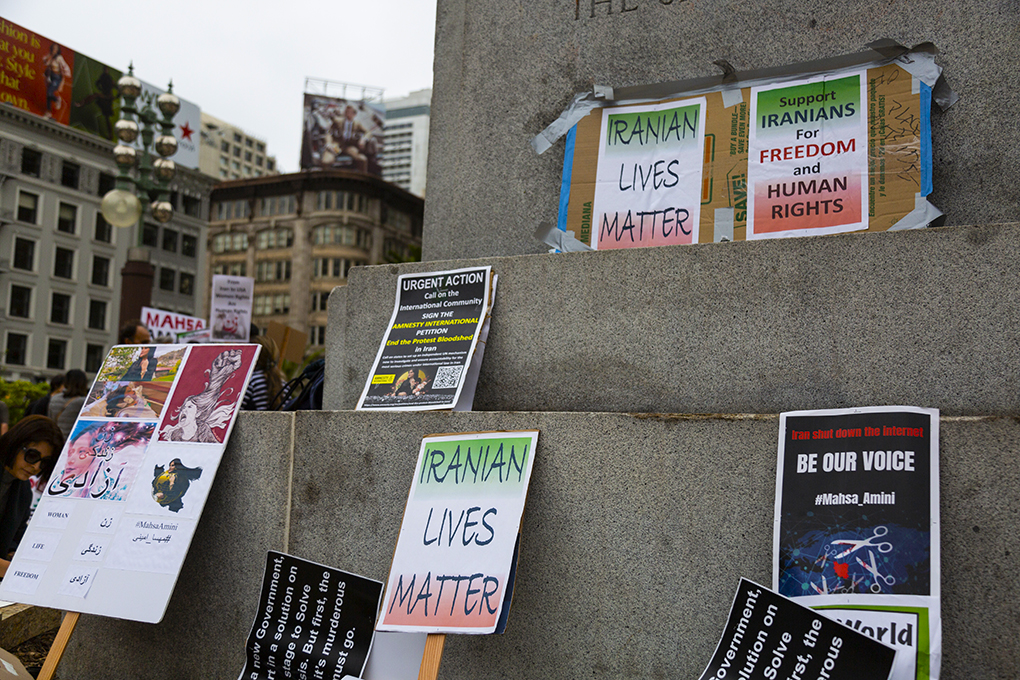 Signs on San Francisco’s Union Square as protesters gather to demand justice for Iran