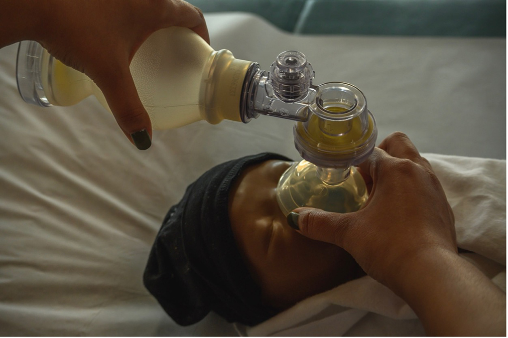 A midwife practices neonatal resuscitation with the Helping Babies Breathe