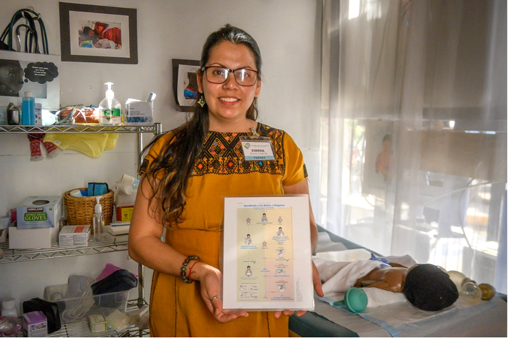 Ximena Rojas with the Helping Babies Breathe teaching model at her midwifery practice in Tijuana