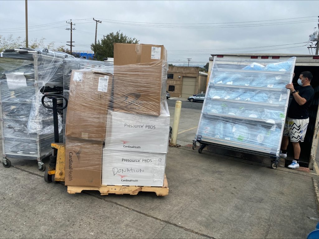 A photo of boxes on top of a pallet.