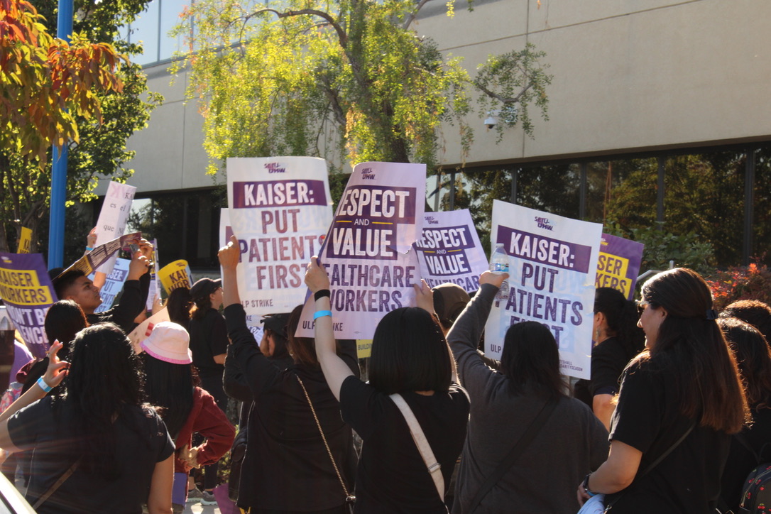 Workers strike in front of the Kaiser Redwood City Medical Center