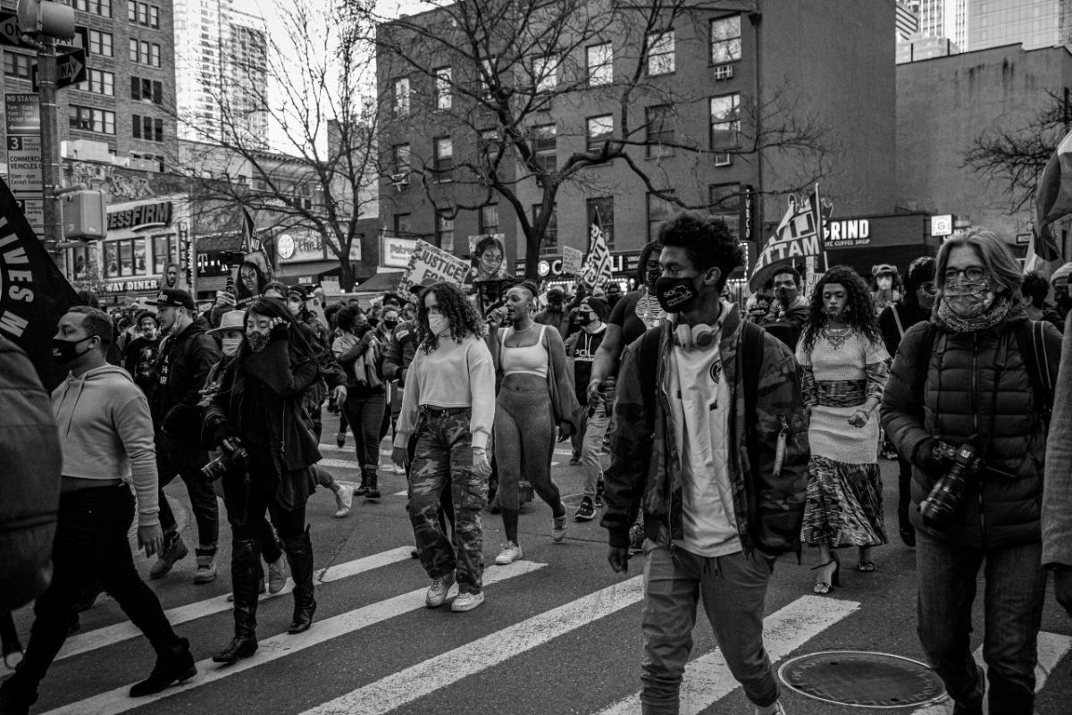 Protesters walking down the street.